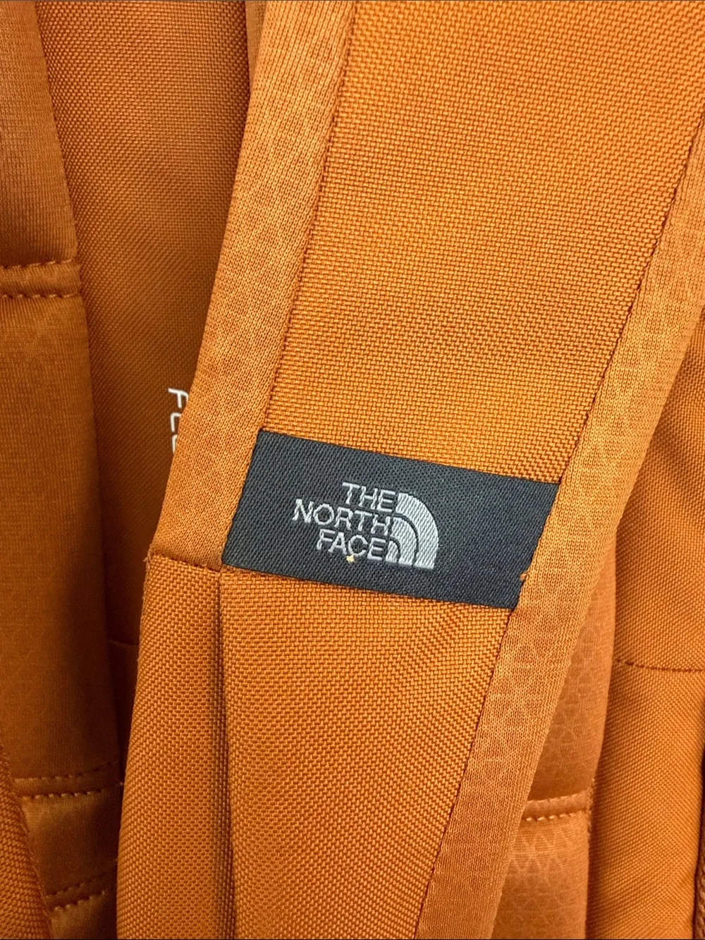 North Face Jester Backpack in burnt orange & black accents Excellent Condition